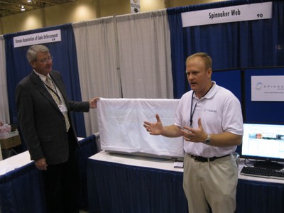 Spinnaker President Mike Burgess telling the history of the Greensburg website with Greensburg Mayor Bob Dixson getting read to unveil the new website.